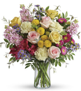 bountiful blend of roses, alstroemeria, stock and asters in cheerful shades of pink, yellow and lavender