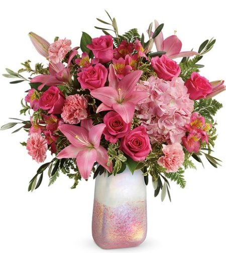 Inspired rose quartz, the gemstone symbolizing love, this iridescent art glass vase and luxurious pink rose blushes with romance!