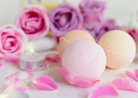 bathbombs with flowers in background